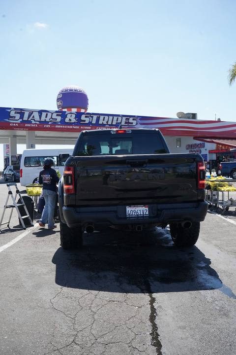 Black Ram TRX under the Stars and Stripes sign and flag