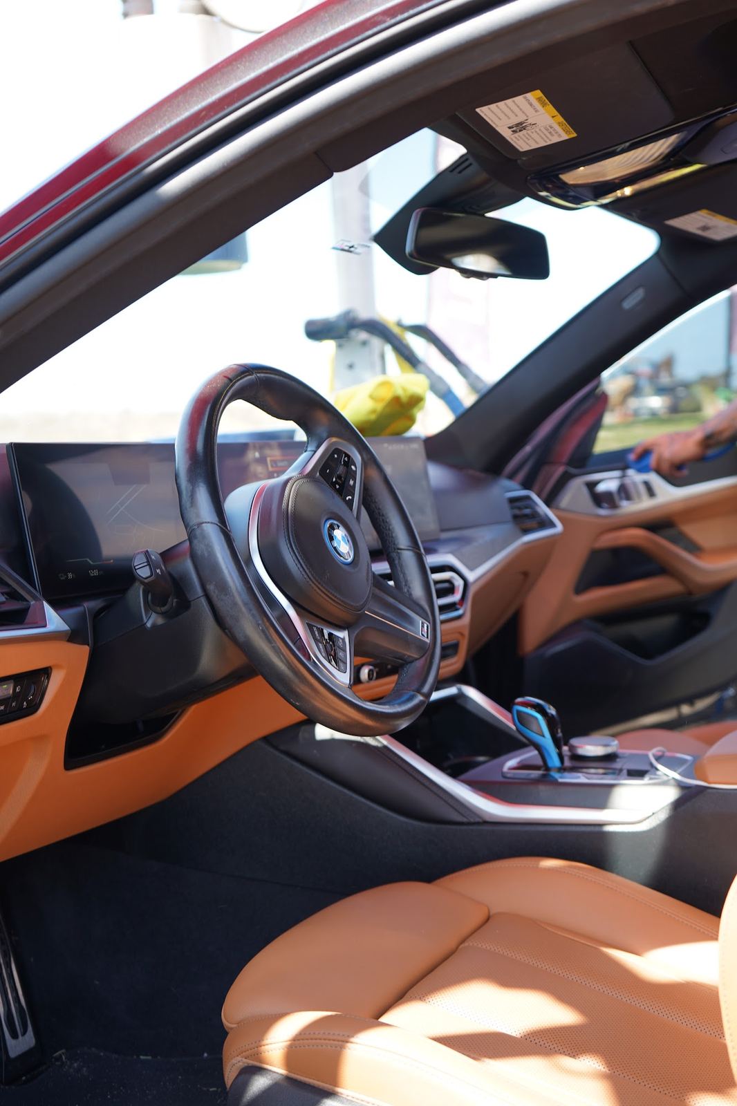 Cognac leather interior of a BMW after detailing