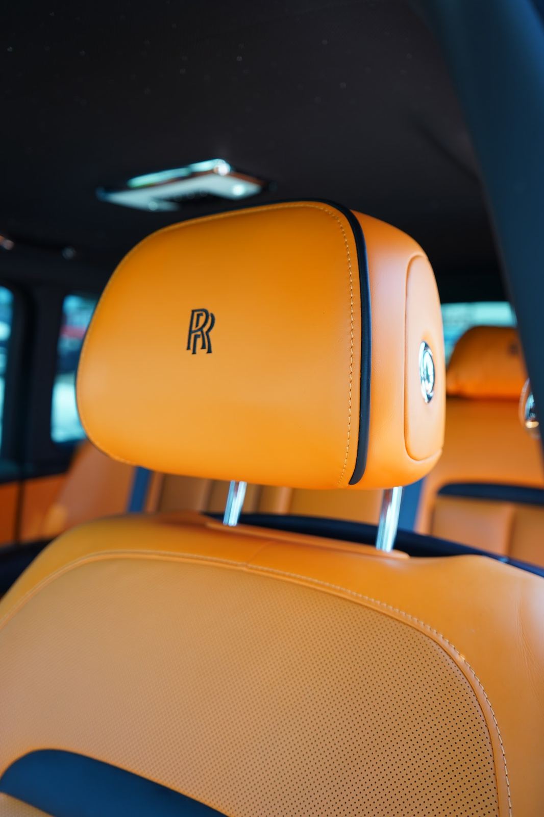 Orange leather seats inside a Rolls-Royce Cullinan